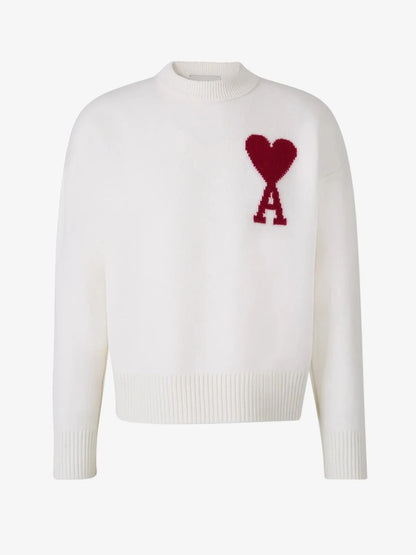SWEATER MIT HERZ